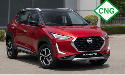 Red Nissan Magnite CNG with CNG Emblem