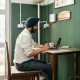 Candidate checking IISER IAT answer key on laptop