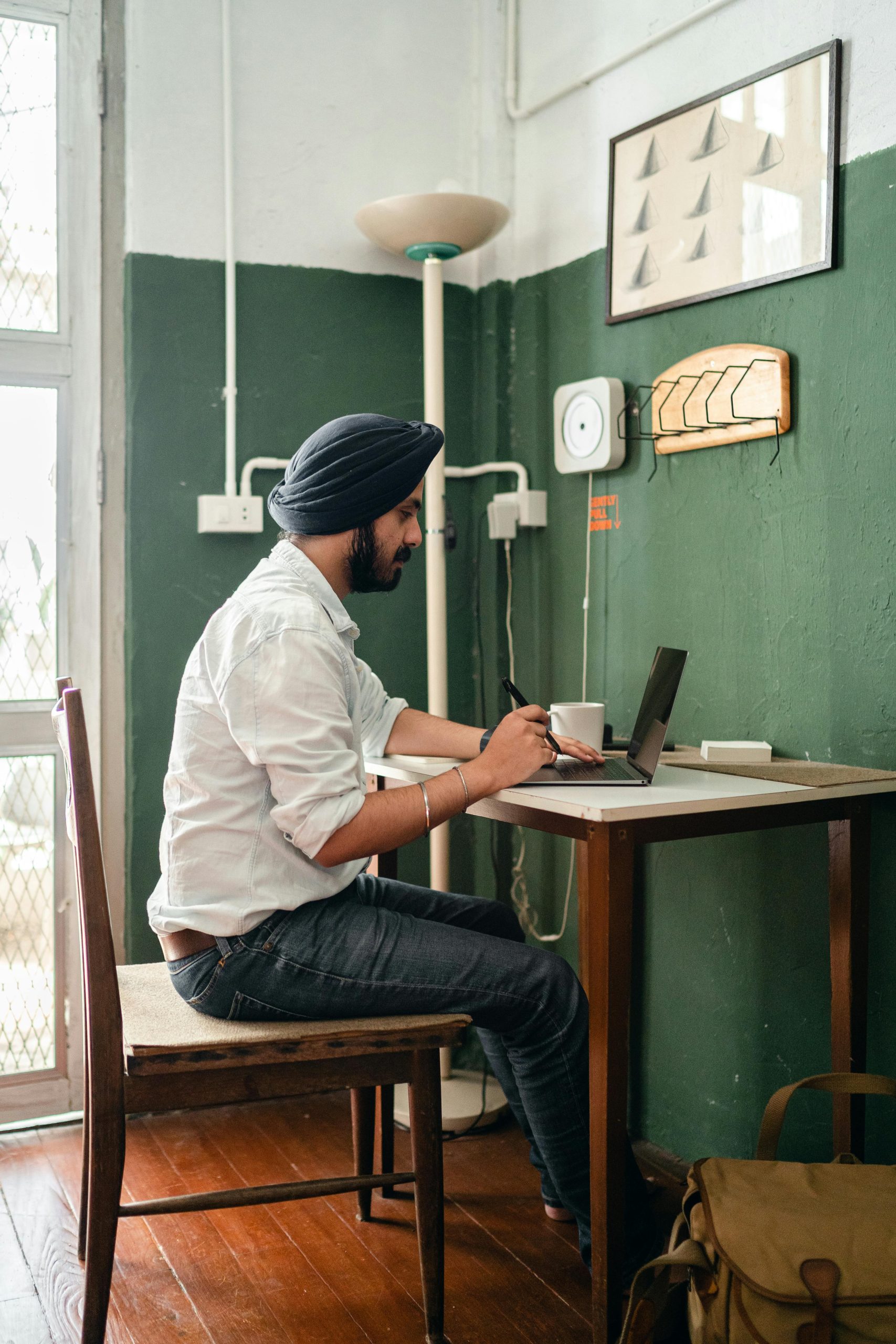 Candidate checking IISER IAT answer key on laptop