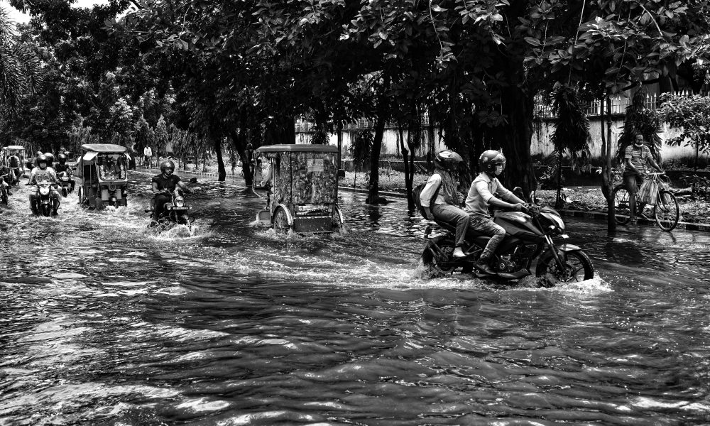 Flooded Bengaluru street and grieving family