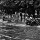 Flooded Bengaluru street and grieving family