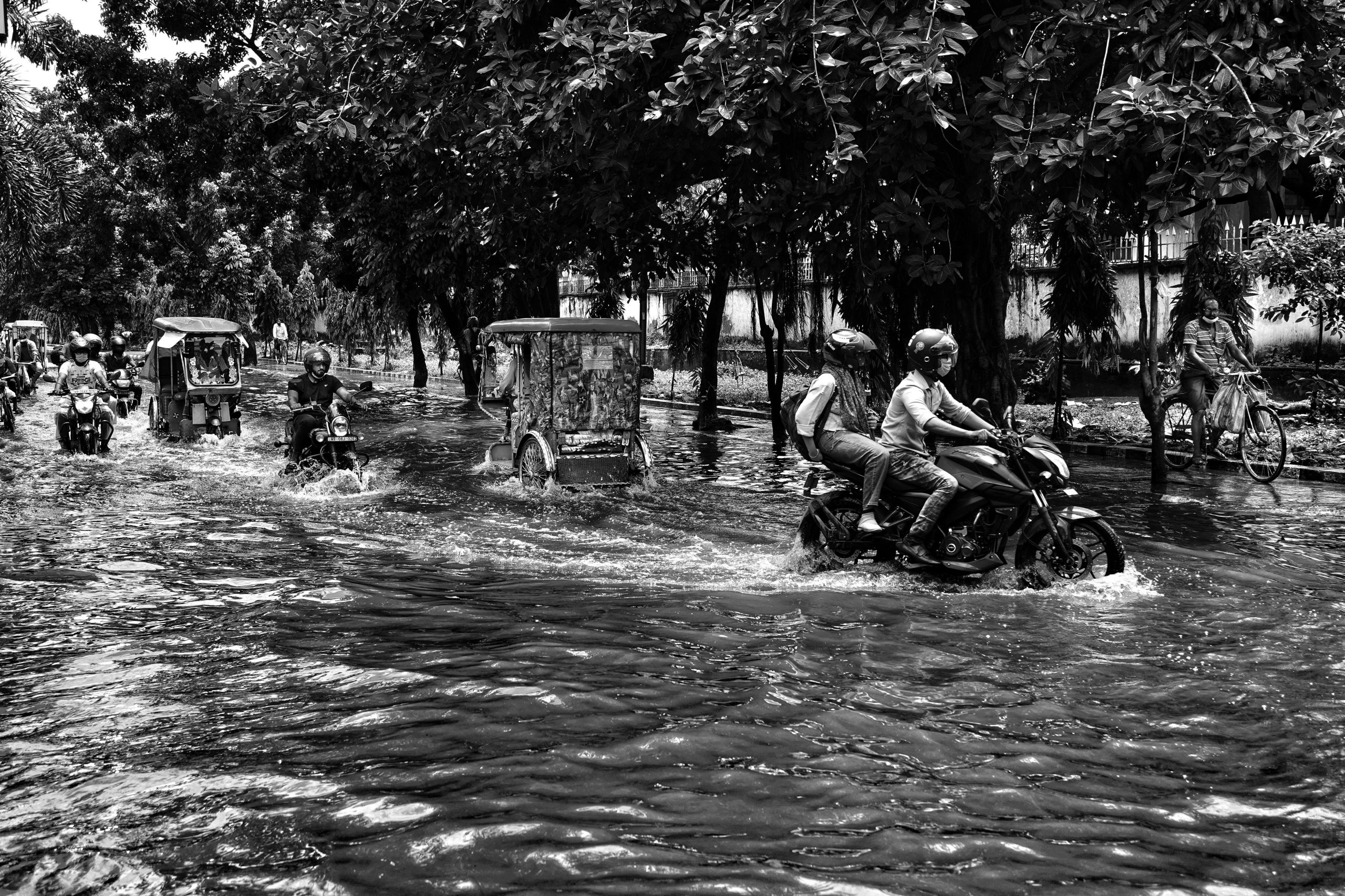 Flooded Bengaluru street and grieving family